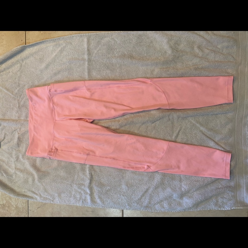 Feed Me Fight Me pink leggings
